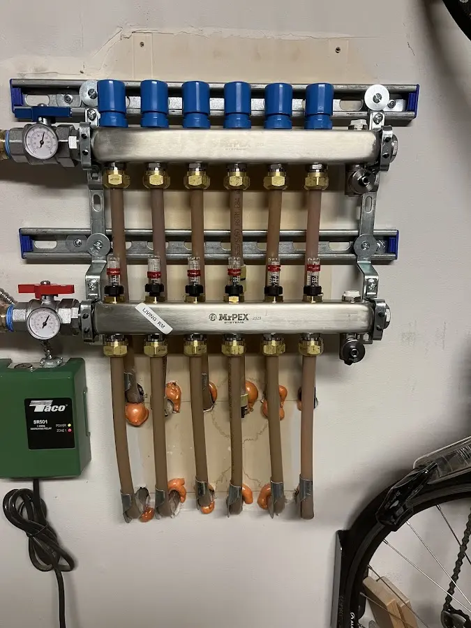 Plumber performing Gas Line Installation at a residential property in Winterport